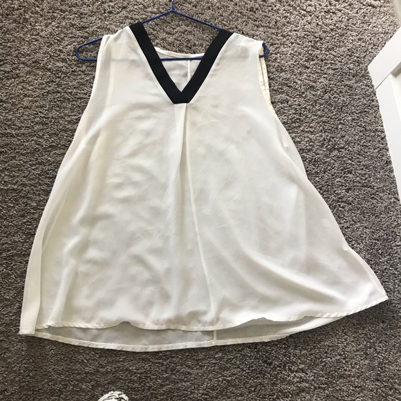 White sleeveless see through blouse. - Picture 3 of 5